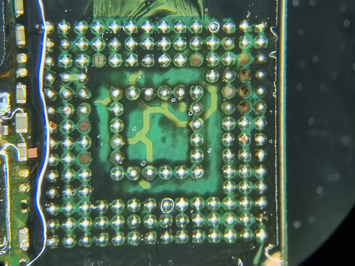 BGA chip under microscope during chip-off